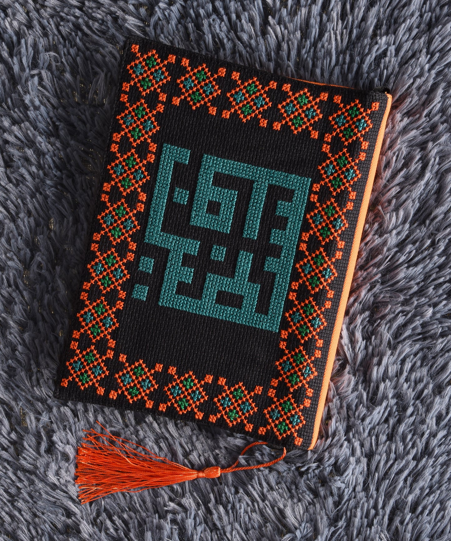 Faded Jade and Orange Book Cover